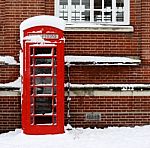 Phonebox In The Snow Stock Photo