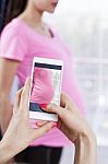 Photographing Pregnant Women Ith Smart Phone Stock Photo