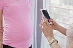 Photographing Pregnant Women Mobile Phone Stock Photo