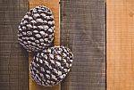 Pines Cones On Wood Christmas Background Stock Photo