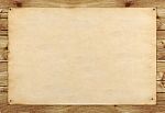 Plain Paper Board On Wood Plank Stock Photo
