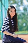 Portrait Happy Face Of Asian Girl Toothy Smiling Happiness Emotion In Outdoor Sport Field Stock Photo