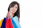 Portrait Of A Beautiful Woman With Colored Shopping Bags Stock Photo