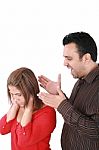 Portrait Of A Young Woman Gets Earful From An Annoyed Man Agains Stock Photo