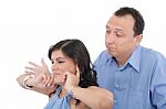 Portrait Of A Young Woman Gets Earful From Her Husband Against W Stock Photo