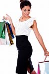 Portrait Of A Young Woman Holding A Shopping Bags Stock Photo