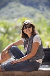 Portrait Of Asian 40s Years Woman Wearing Straw Hat And Sun Glasses Toothy Smiling Face With Happiness Emotion Relaxing On Vacation Stock Photo