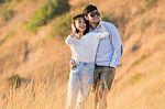 Portrait Of Asian Younger Man And Woman Relaxing Vacation At Sea Side Happiness Emotion Stock Photo