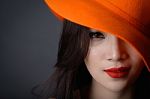 Portrait Of Beautiful Asian Woman Model In Orange Striped Hat Wi Stock Photo