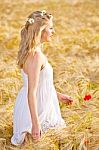Portrait Of Beautiful Girl In Field Stock Photo
