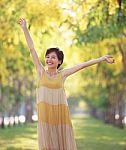 Portrait Of Beautiful Young Asian Woman Feeling Free With Relaxi Stock Photo