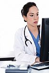 Portrait Of Beautiful Young Doctor Working Stock Photo