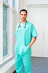 Portrait Of Confident Male Surgeon In Uniform Stock Photo