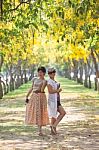 Portrait Of Couples Beautiful Asian Woman Standing In Blooming F Stock Photo