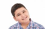 Portrait Of Happy Little Boy Over White Background Stock Photo