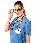 Portrait Of Happy Smiling Young Female Doctor Stock Photo