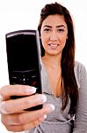 Portrait Of Smiling Woman Showing Cell Phone Stock Photo