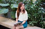 Portrait Of Thai Adult Businesswoman Beautiful Girl Read A Book Stock Photo