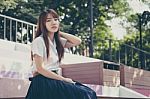 Portrait Of Thai Adult Student University Uniform Beautiful Girl Relax And Smile Stock Photo