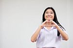 Portrait Of Thai High School Student Uniform Beautiful Girl Give Heart Stock Photo