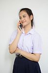 Portrait Of Thai High School Student Uniform Teen Beautiful Girl Calling Smart Phone, Stock Photo