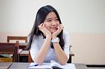 Portrait Of Thai Teen Beautiful Girl Writing Book Stock Photo