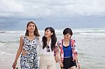 Portrait Of Young Asian Woman Friend Group Relaxing Cacation On Sea Beach With Smiling And Happiness Face Stock Photo