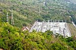 Power Plant In Deep Green Rain Forest Stock Photo