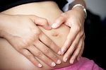 Pregnant Lady Showing Love Sign Stock Photo