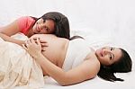 Pregnant Mother With Her Daughter Stock Photo