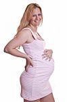 Pregnant Woman Holding Tummy Stock Photo