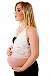 Pregnant Woman Standing Stock Photo