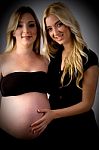 Pregnant Woman With Her Sister Stock Photo