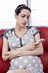 Pregnant Woman With Smart Phone Stock Photo