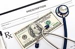 Prescription With Money And Stethoscope Stock Photo