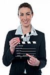 Pretty Business Lady With Clapperboard Stock Photo
