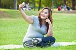 Pretty Fat Female Takes Travel Selfie Stock Photo