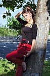 Pretty Woman On Sunny Day In Park Stock Photo
