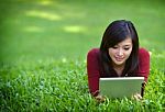 Pretty Woman Using Tablet Stock Photo