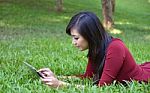 Pretty Woman Using Tablet Stock Photo