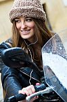 Pretty Young Woman Over A Motorcycle On The Street Stock Photo