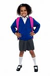 Primary School Girl Posing Confidently Stock Photo