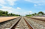 Railroad Blue Sky And Cloudy Sky Clouds Railroad Stock Photo