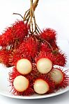 Rambutan Fruit On Plate Stock Photo