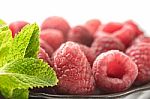 Raspberries With Mint On The Metal Plate Stock Photo
