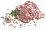 Raw Pork Meat Steaks With Spices On The White Background Stock Photo