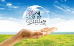 Real-estate Bubble On The Hand Stock Photo