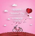 Red Bikes Parked On The Grass With Heart Shaped Balloons  Floati Stock Photo