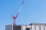Red Construction Cranes In Japan Stock Photo