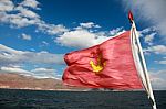Red Flag With Anchor Sign Stock Photo